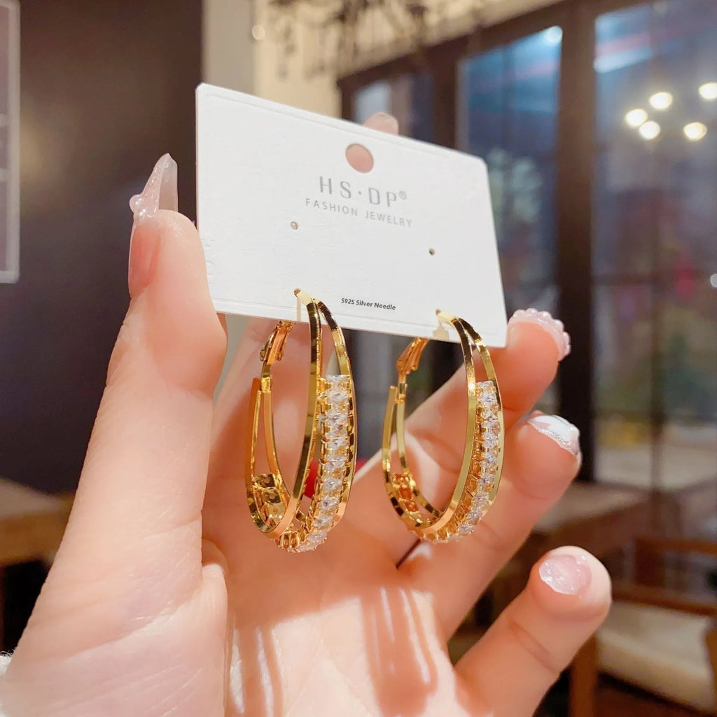 Zircon oval earrings in thick gold plated copper with geometric round shape, fashion OL style