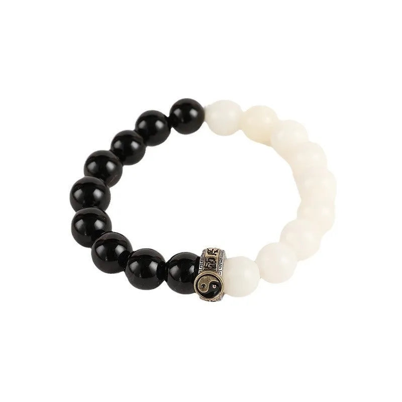 Geometric black and white obsidian Tai Chi bracelet with woven six-word mantra pattern