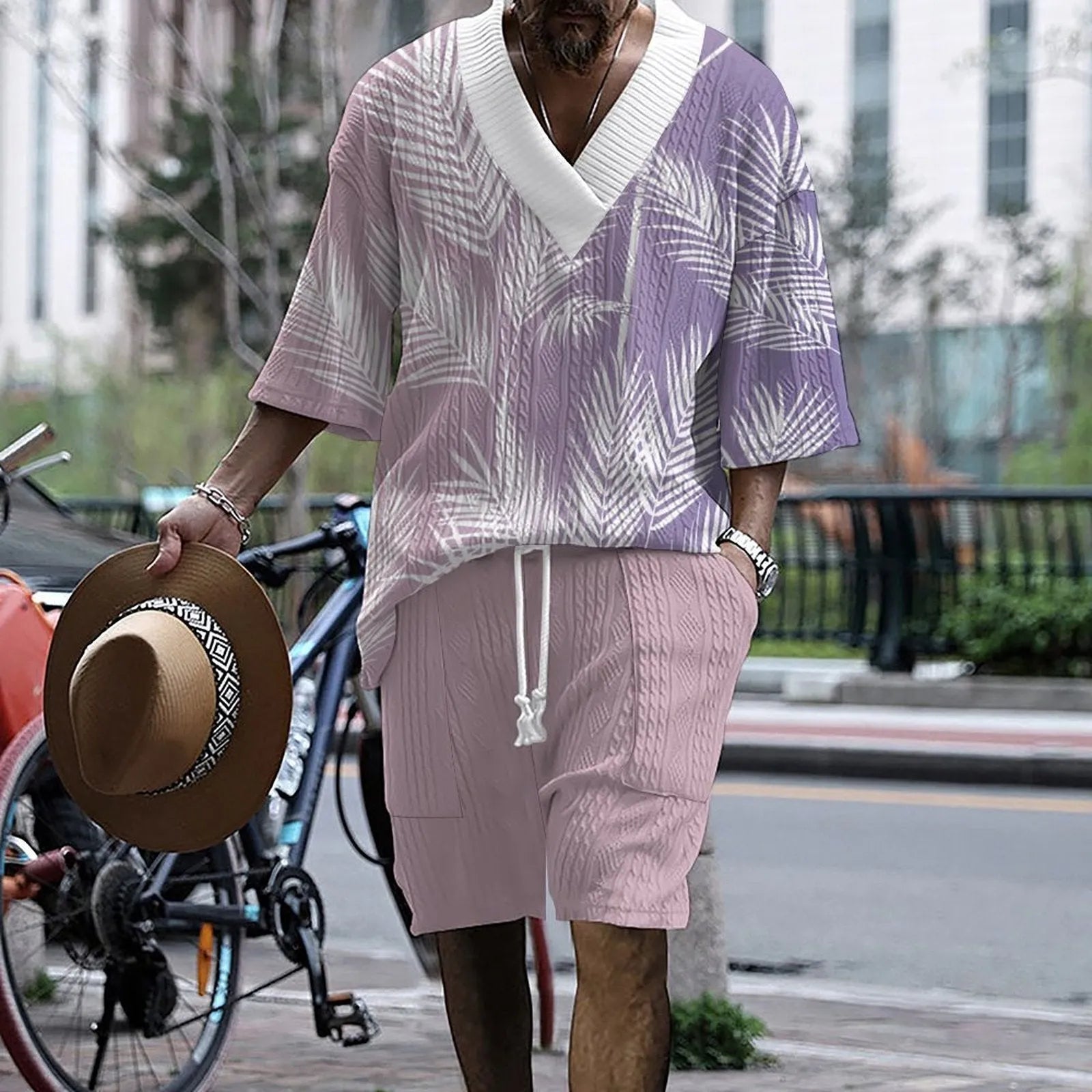 Men's knitted drop-shoulder short-sleeve top and matching shorts suit set on a mannequin.