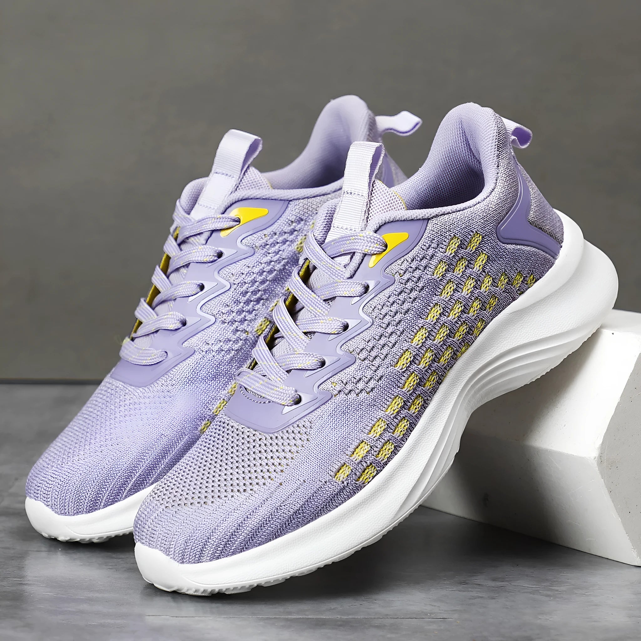 Women's Lavender Purple Flyknit running shoes with striped mesh design and EVA sole