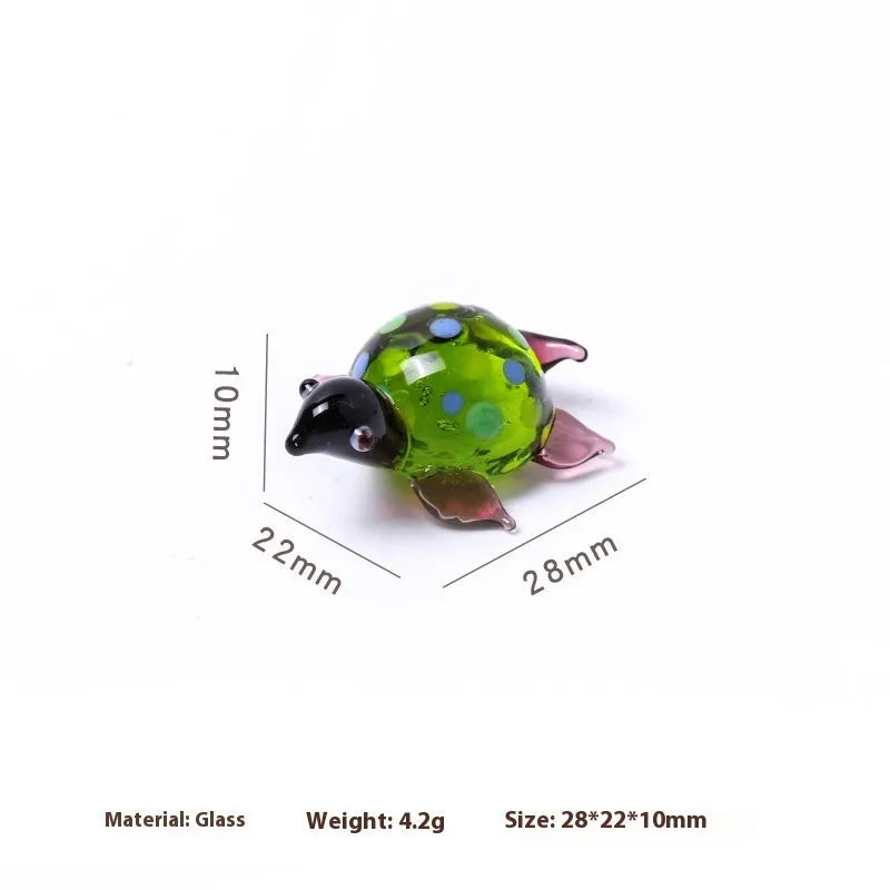 Geometric glass turtle ornament in modern simplicity style with hand-painted details