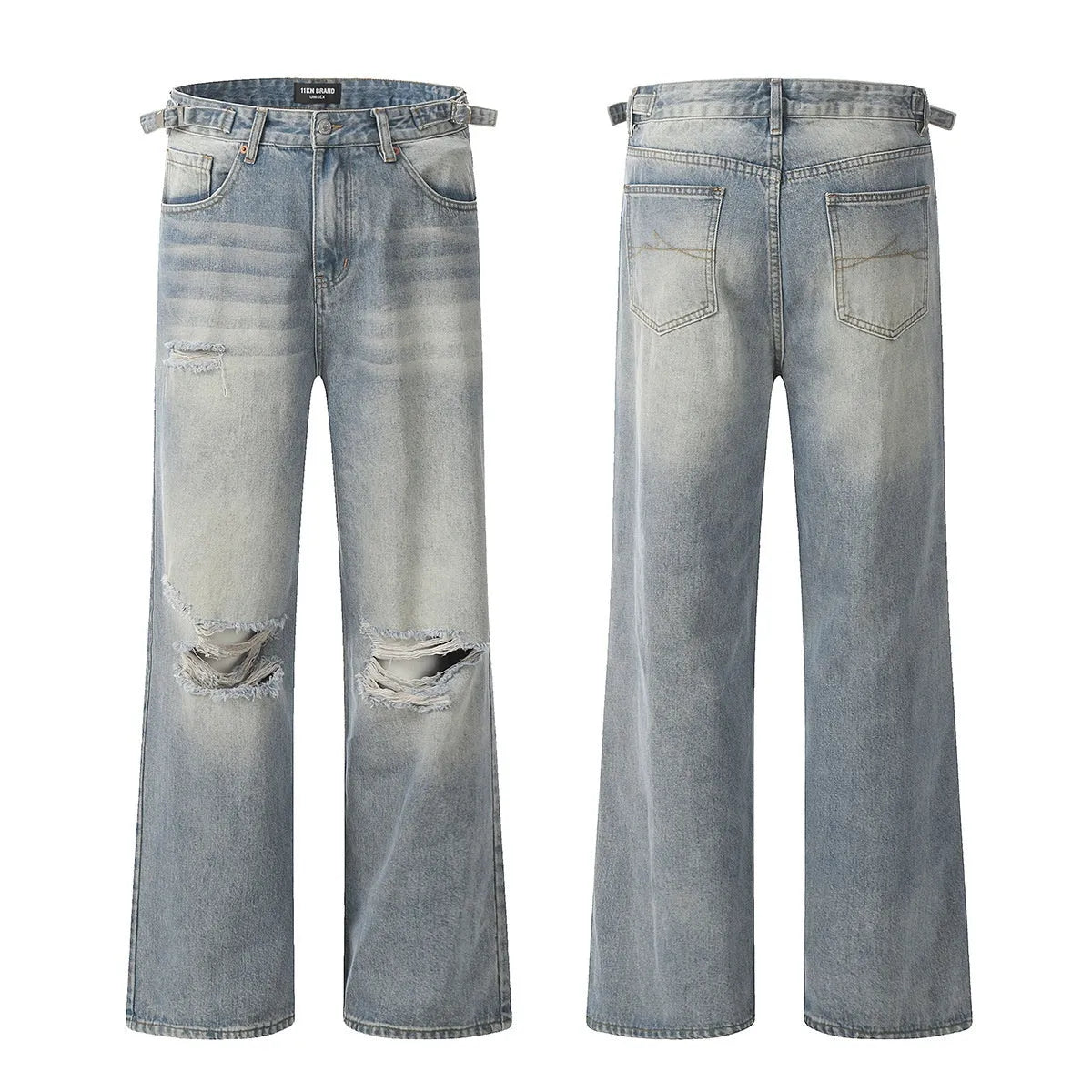 Man wearing blue ripped straight-leg jeans in a retro style with a zip fly.