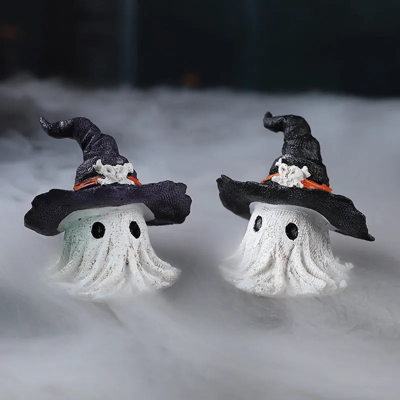 Black and purple resin wizard hat holiday ornament on a festive background.