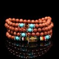 Golden star stone bracelet with 108 nugget sand beads and a fu character charm.
