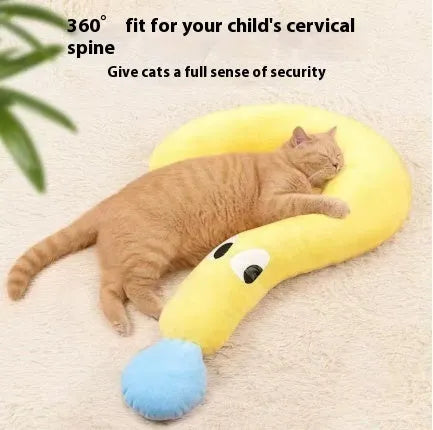 Blue and yellow question mark shaped cat bed with a U-shaped pillow for neck support on a wooden floor.
