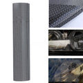 Sheet of perforated plastic colour changing film for car windows, 30 cm wide.