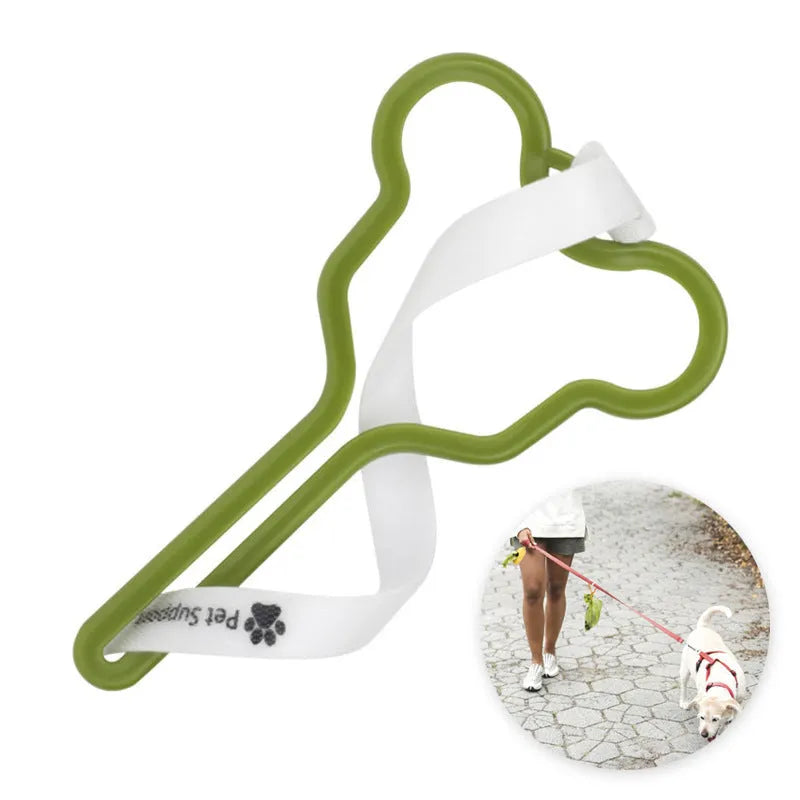 A dog poo bag holder with a hands-free clip and black Velcro strap attached to a leash.