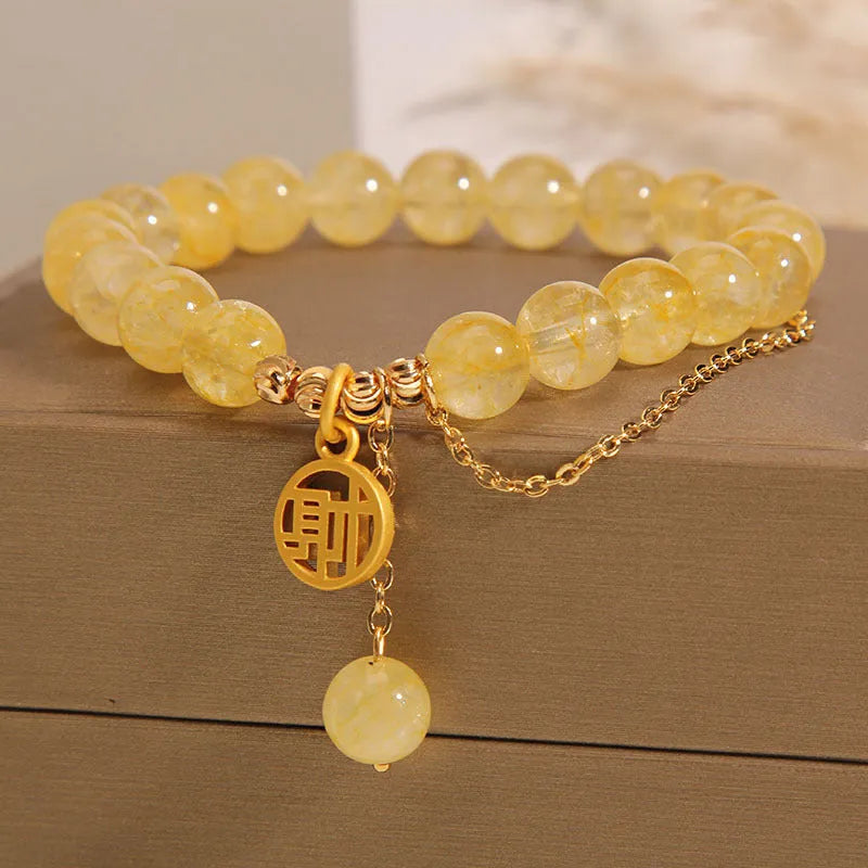 Citrine Chinese character bracelet with tassel detailing showing Caizi and Fu design options