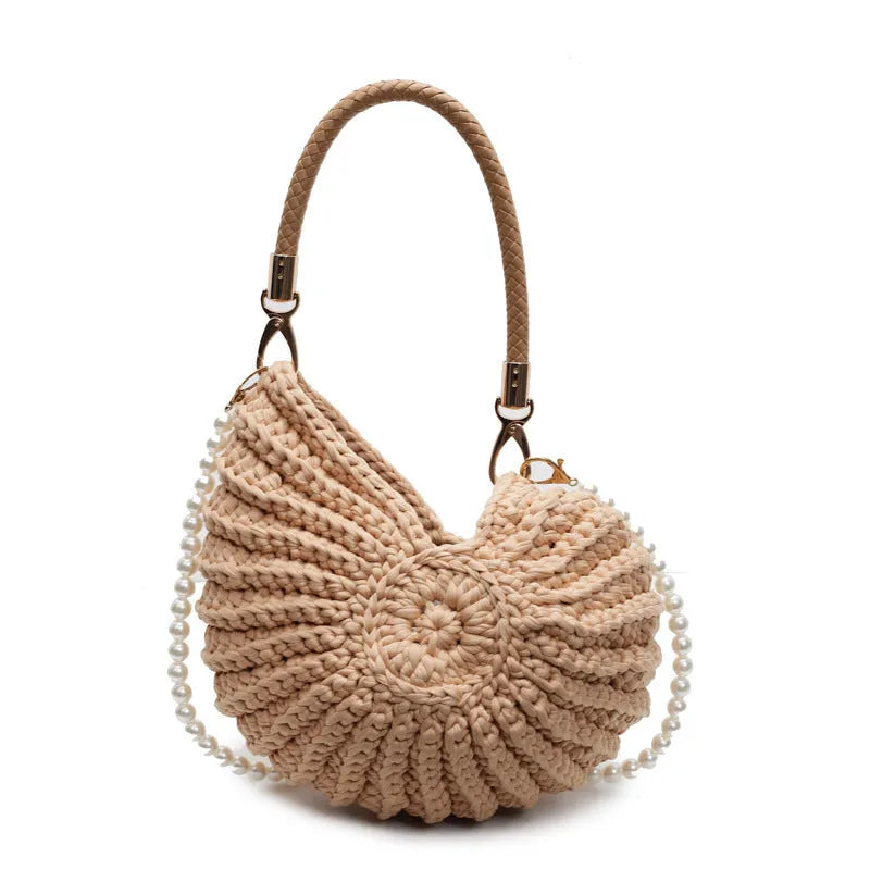 Handmade woven cloth bag in retro style with open pocket and double shoulder straps.