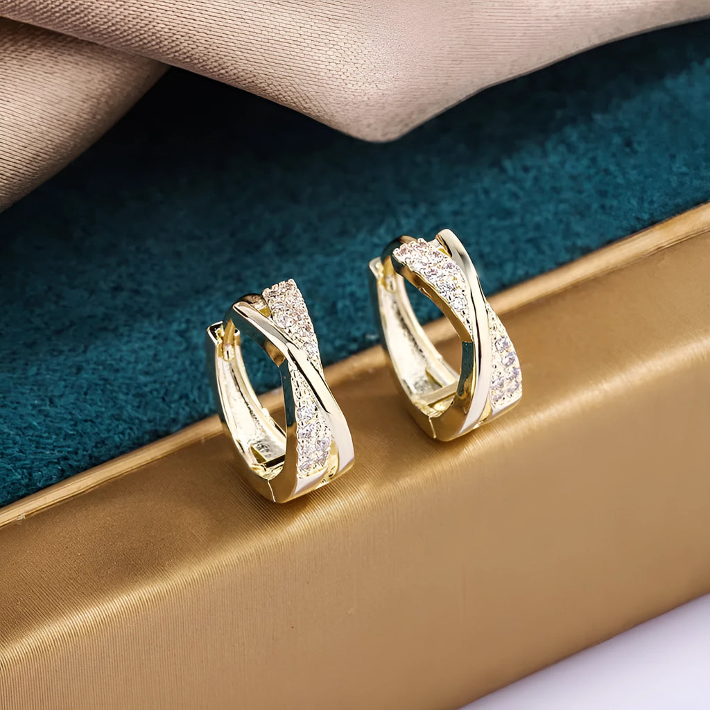 Pair of geometric earrings with 14K yellow finish on copper