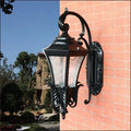 European-style black outdoor courtyard wall lamp with solar panel and traditional design