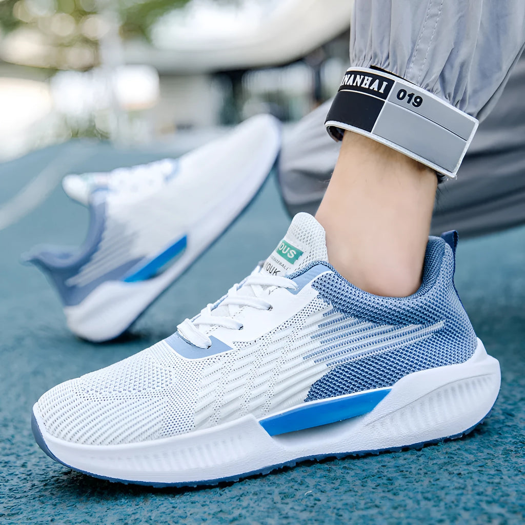 Men's blue casual mesh sports shoes with round toe and fabric upper on a wear-resistant sole.