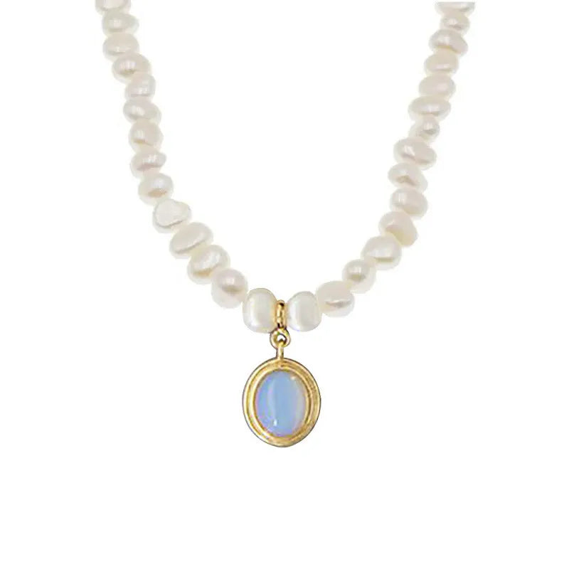 Sterling silver necklace with geometric pearl pendant showing adjustable length chain