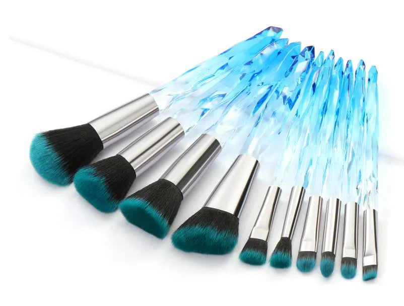 10 crystal handle foundation brushes with artificial fibre bristles in black, blue, red, and yellow colours