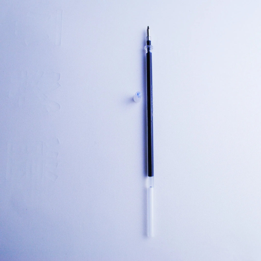 Set of eight blue ink pen refills with 0.5mm tips, a spare pole, and a plastic pen holder.