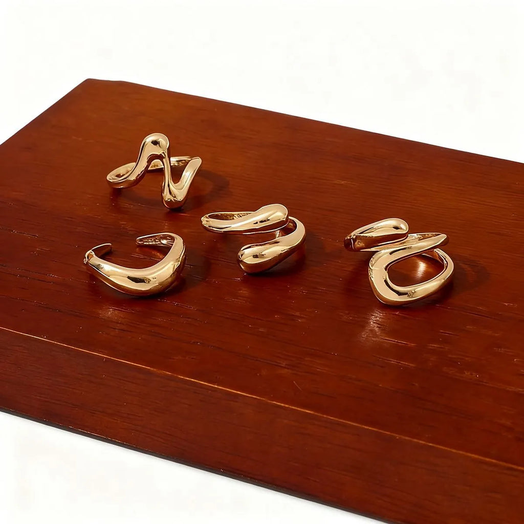 Open multi-piece ring set in Gold or Silver electroplated metal with geometric shape