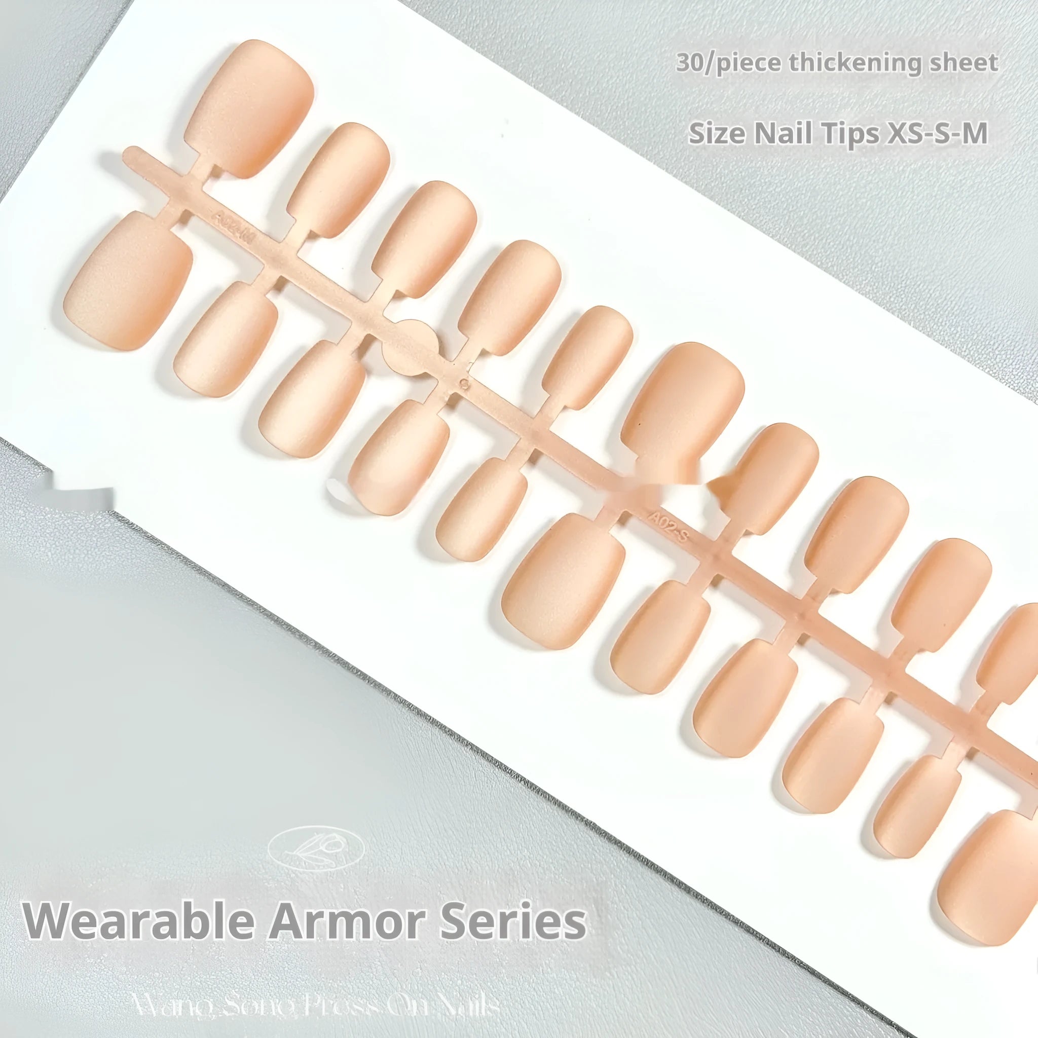Frosted velvet Cat's Eye Aurora artificial nail art set in short ladder sizes on a display hand.