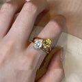 Geometric copper open ring for women with a water drop zircon stone in a pop style.