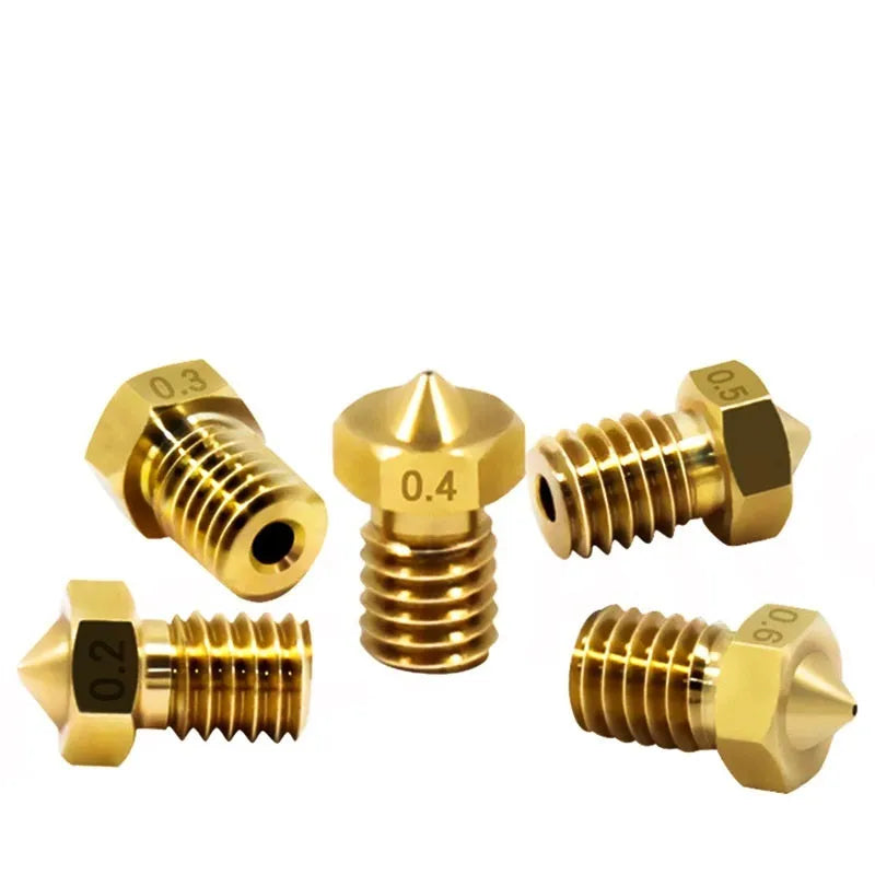 Brass 3D printer nozzle with M6 thread, shown next to a ruler for scale displaying 12.5mm length.
