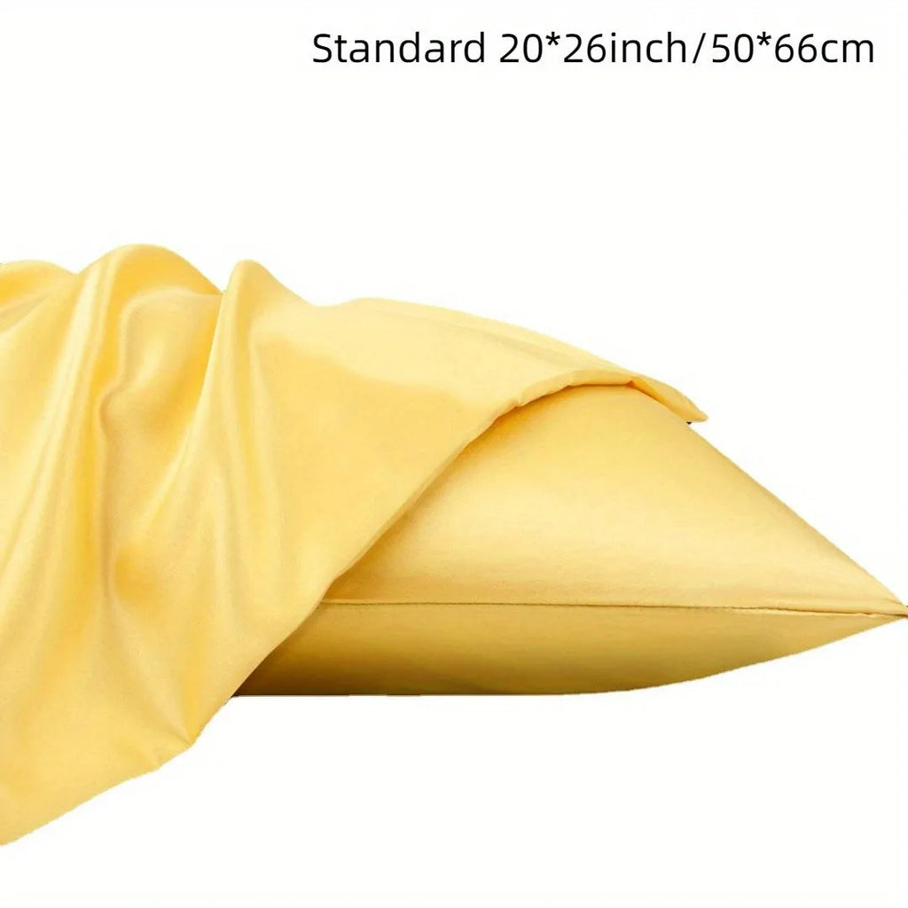 A pair of solid colour satin cloth pillowcases in a choice of thirteen colours including navy blue and rose red.