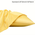 A pair of solid colour satin cloth pillowcases in a choice of thirteen colours including navy blue and rose red.