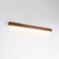 Walnut colour long wooden strip wall lamp with integrated LED lighting mounted on a wall.