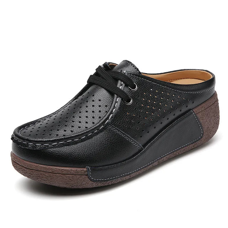 Plus size women's genuine leather platform slippers in black with round toe and hollow-out wedge sole