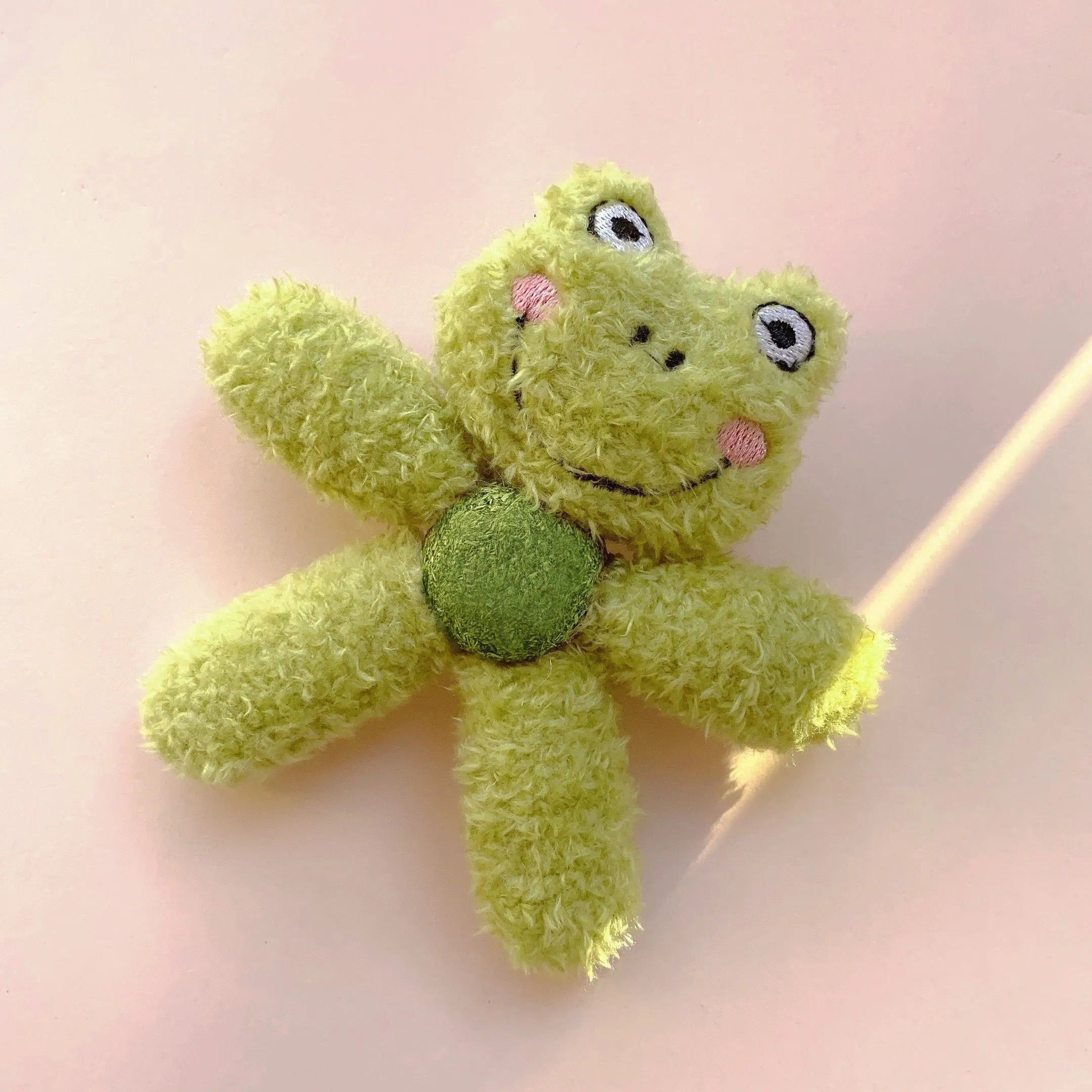 Catnip ball chewing toy in animal designs for feline dental play and entertainment