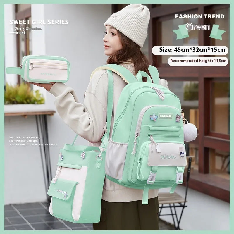 Pink waterproof Oxford cloth school backpack for girls with curved shoulder straps.