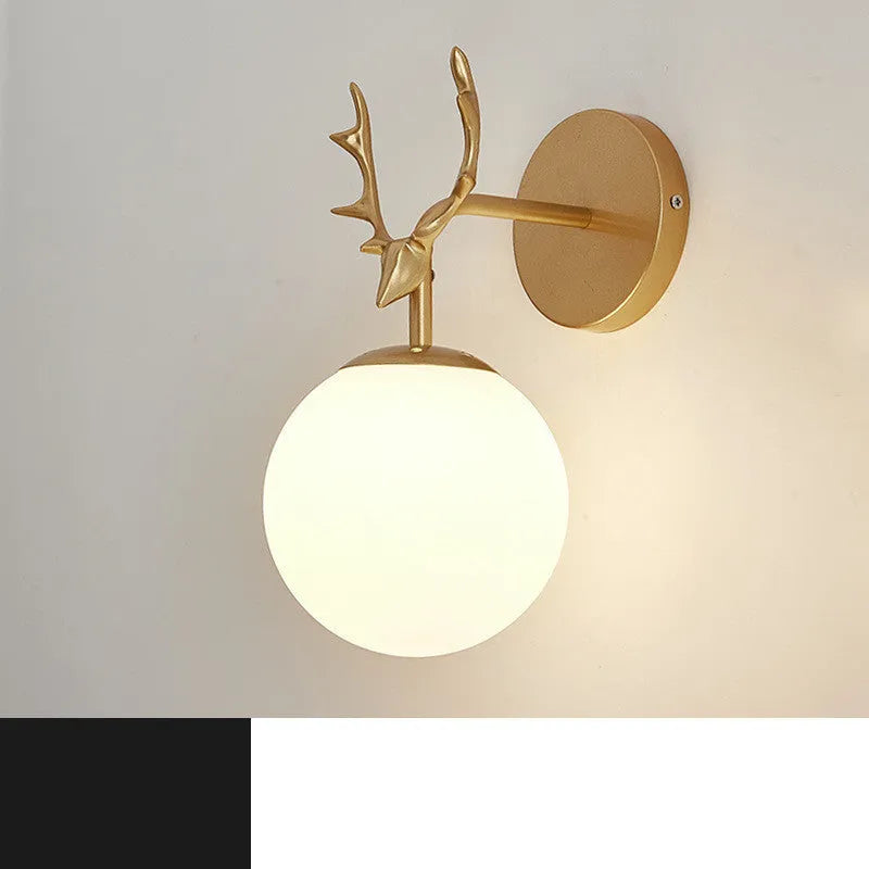 Modern round glass wall sconce with a Nordic design, mounted on a white wall, showing its light-diffusing shade and compact 30cm diameter.