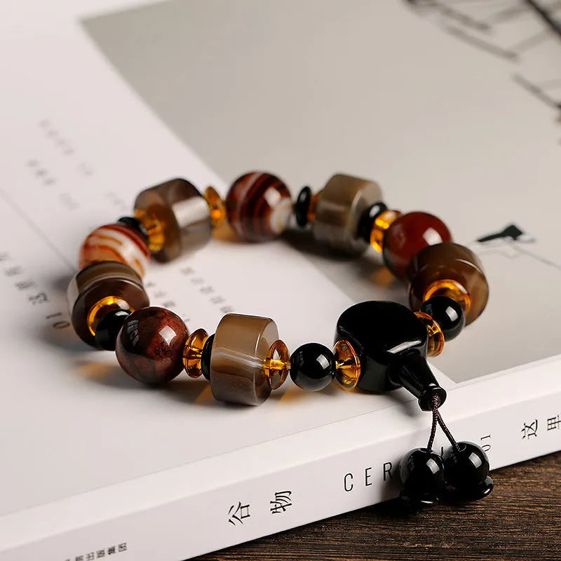 Natural agate bracelet with sardonyx, white, red, and black agate beads in geometric ethnic design