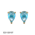 A pair of brass gold-plated drop earrings with a candy-coloured pear-shaped zircon stone.