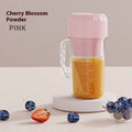 Household USB-powered juicer in cherry blossom pink colour with portable charging capability