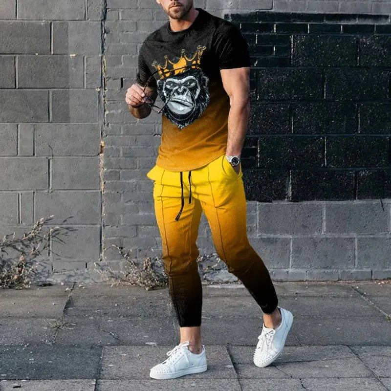 Men's thin short-sleeve printed pullover and matching trousers tracksuit set on a hanger.