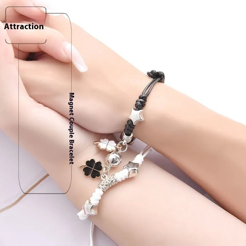 Magnet suction couple bracelets with alloy construction and various pendant designs including crowns and hearts