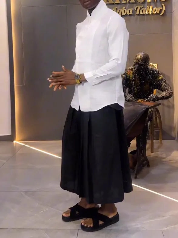 Women's white asymmetrical front long sleeve shirt with black pleated trousers casual set
