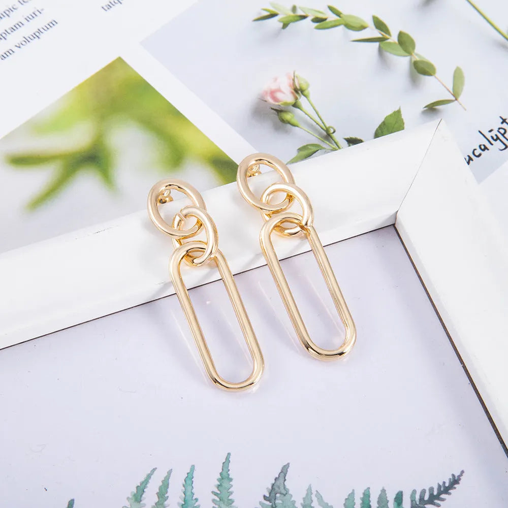Geometric sterling silver needle colour hoop earrings with ring and line design on alloy base
