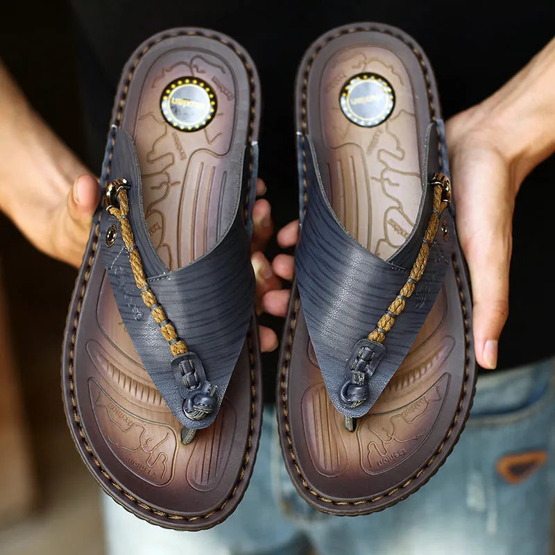 Men's dark blue herringbone textured outdoor slippers with a rubber sole, shown in a plus-size fit.