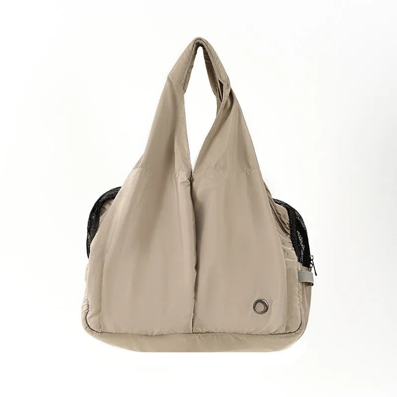 Apricot-coloured cloth pet carrier bag with shoulder strap, medium size for small dogs and cats