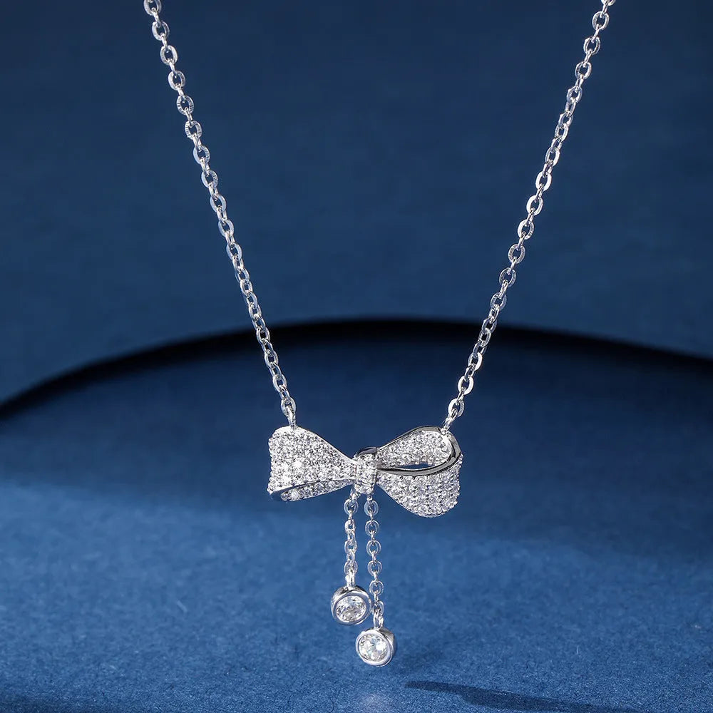 S925 sterling silver necklace with bow pendant on 40-45cm O-ring chain