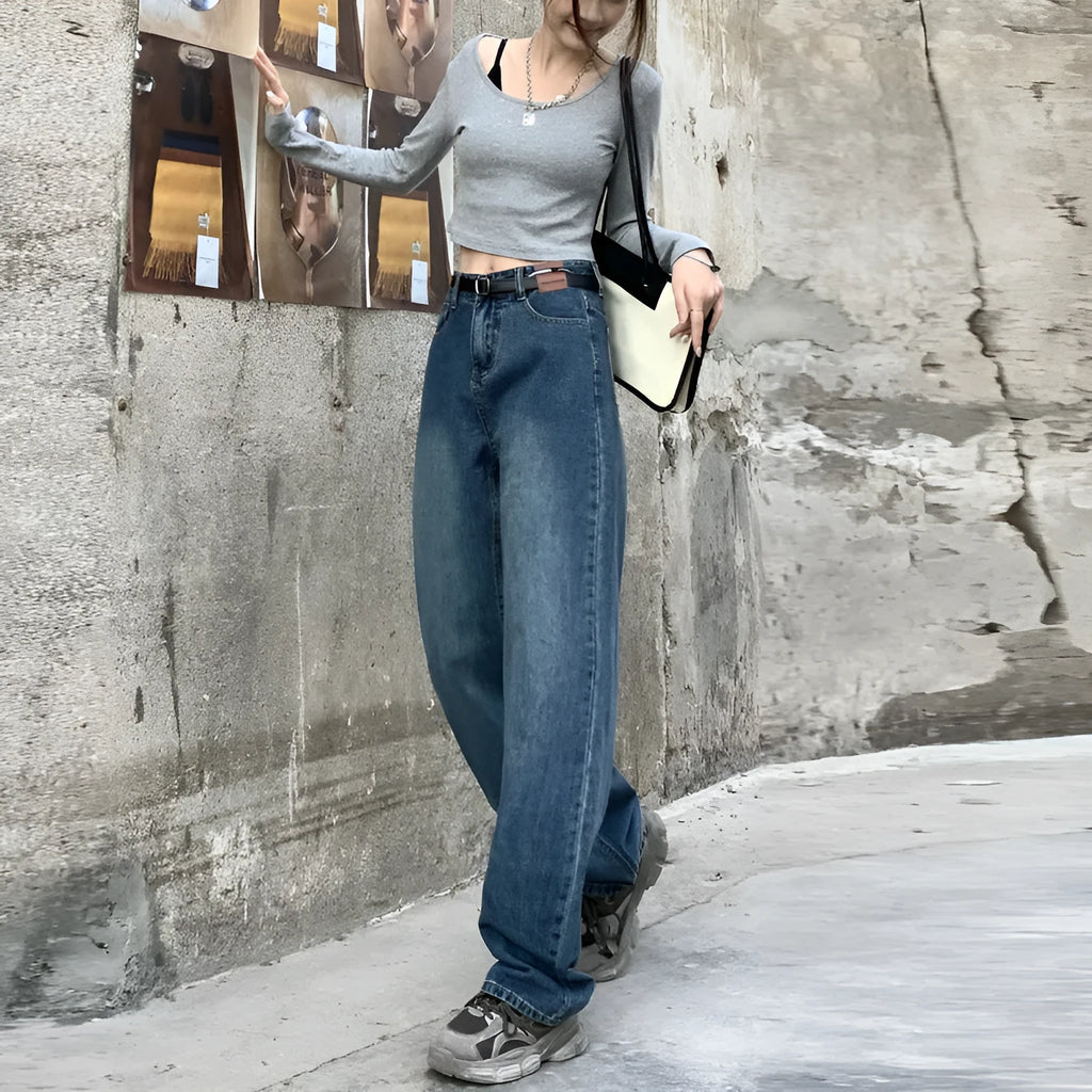 Women's high-waist retro blue straight-leg jeans on a hanger, showing the classic fit.
