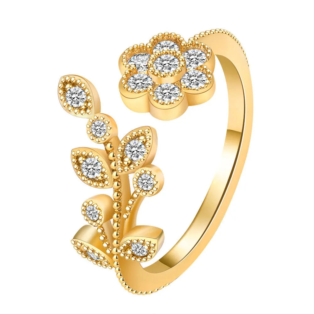 Copper open ring with flower and leaf design in gold or white diamond-treated finish