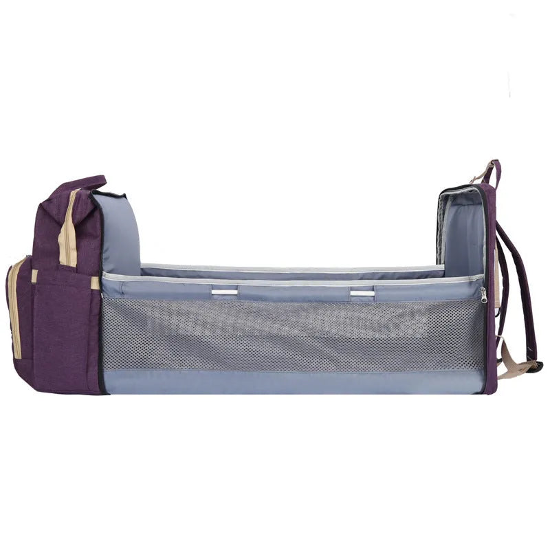 Lightweight nylon mother and baby bag with USB port, curved shoulder strap, shown in blue colour.
