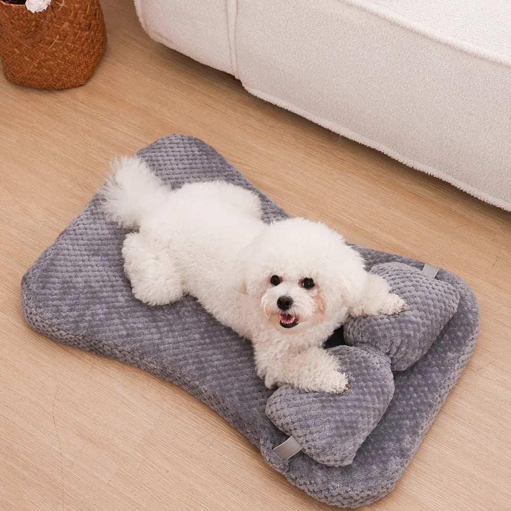 Soft plush pet bed mat with attached pillow in grey, available in sizes S to XL