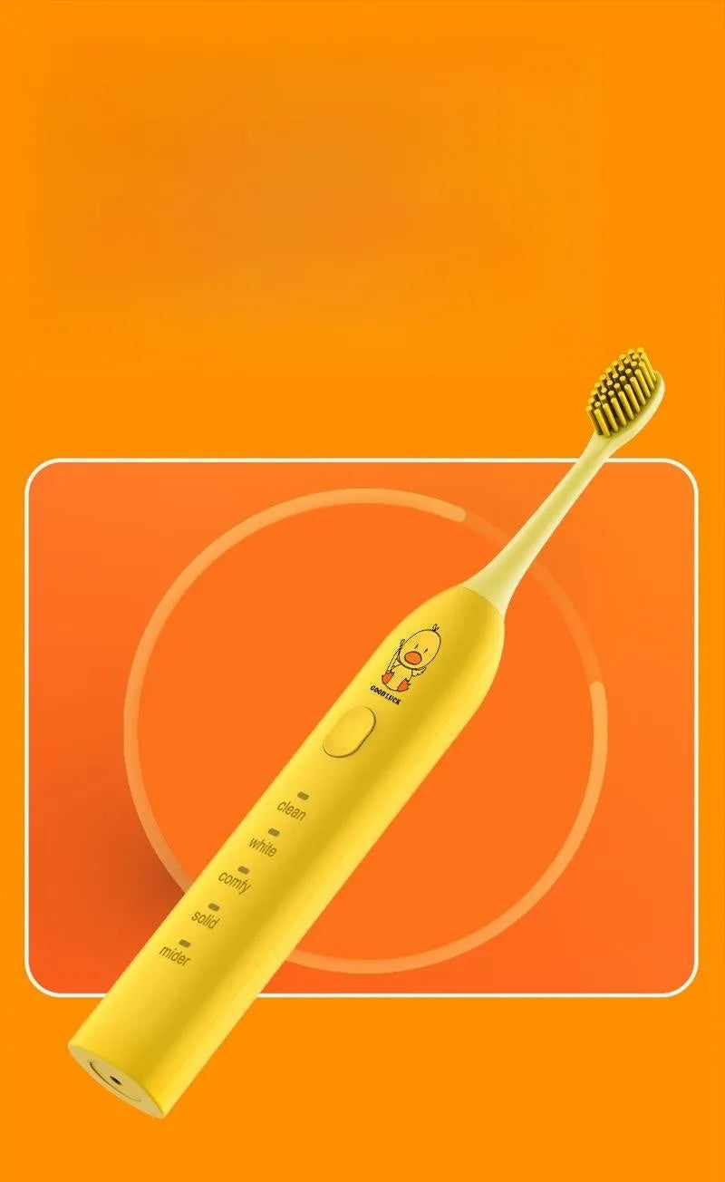 Yellow USB rechargeable adult electric toothbrush with small duck design and soft bristles.