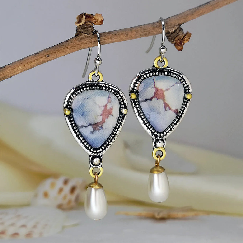 Retro blue geometric drop earrings with electroplated metal, synthetic opal and pearl details