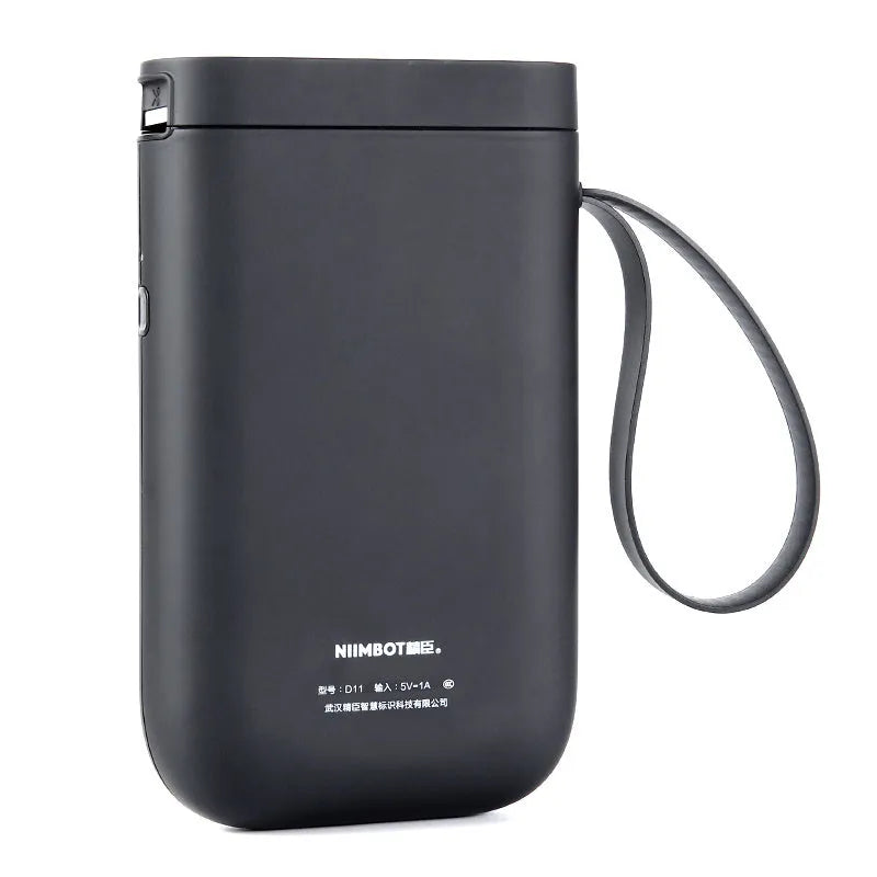 D11 Bluetooth thermal label printer with compact black design shown next to printed labels