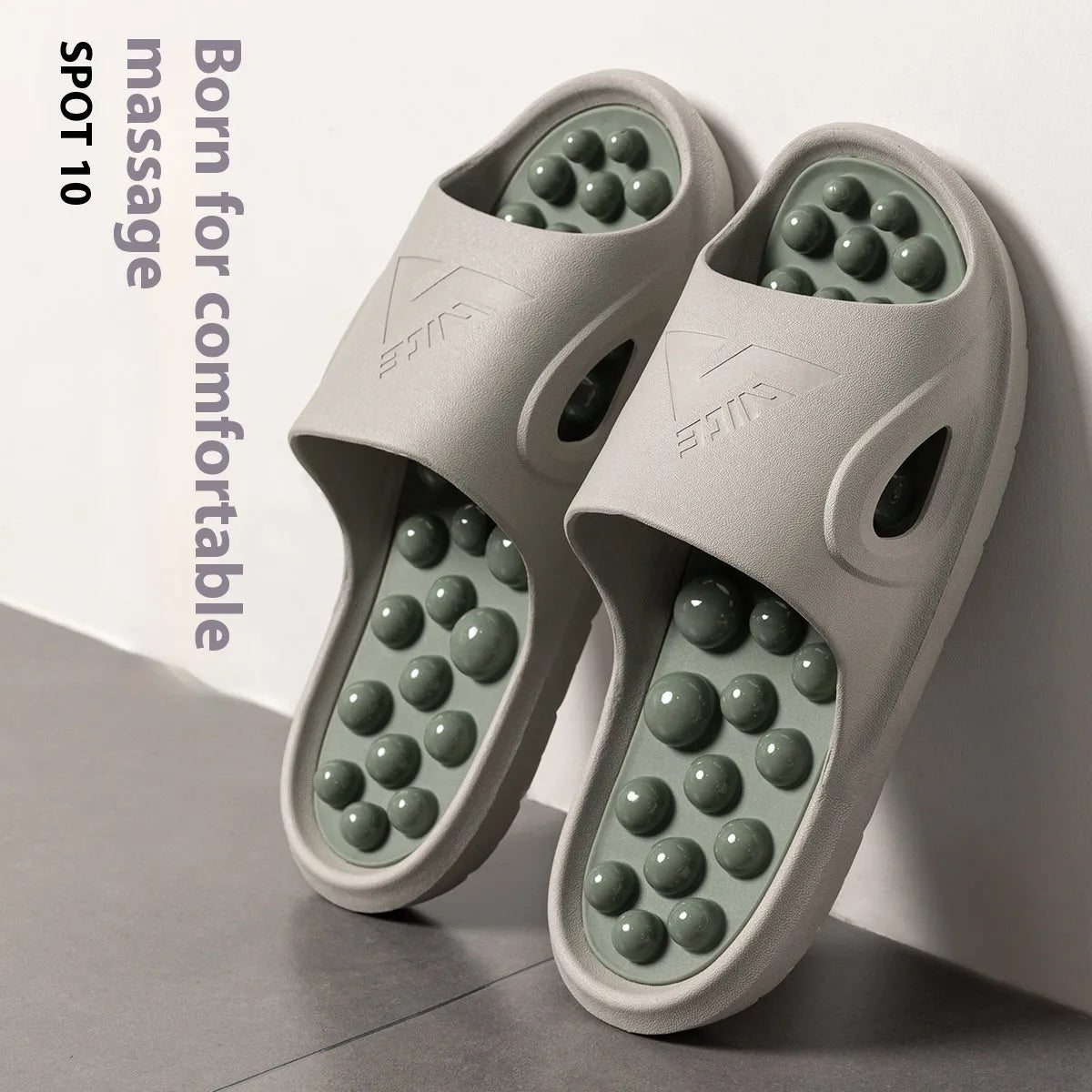 Ball massage sandals in purple, non-slip PVC with grape-particle studs, side view