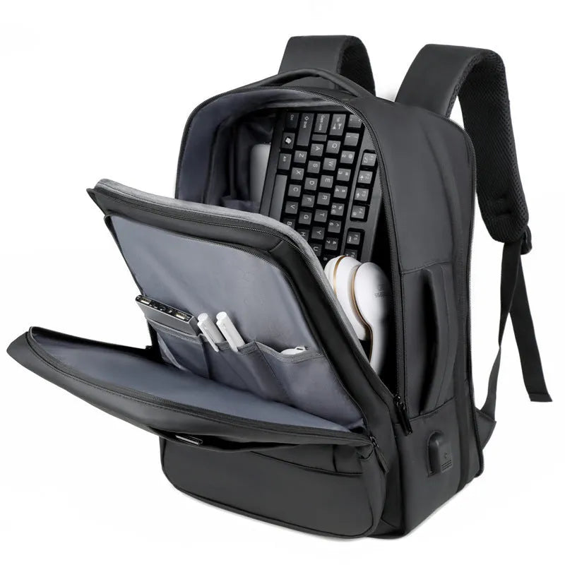 Black waterproof Oxford cloth backpack with curved shoulder strap showing 20-35L capacity for business travel