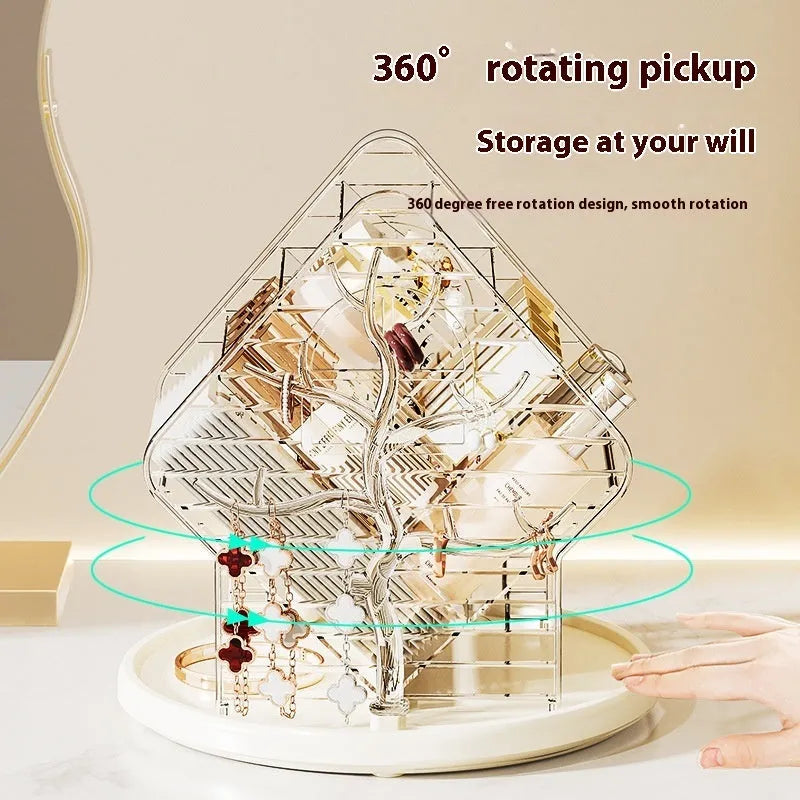 Rotating clear plastic cosmetics organiser box with multiple tiers on a wooden dresser.